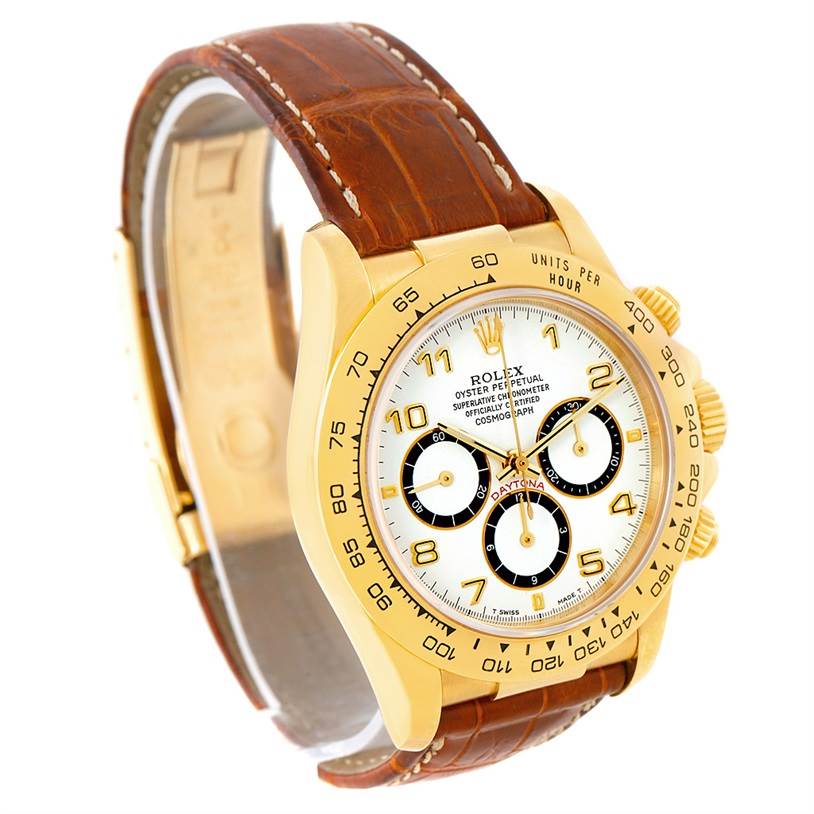 This Rolex Daytona 16518 Men's Yellow Gold White Dial 16518 Men's Yellow Gold White Dial watch is shown from a front angle, displaying its face, bezel, case, crown, and leather strap.