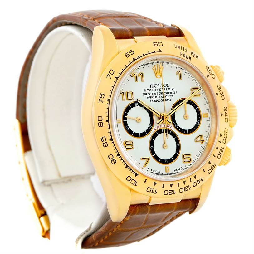 This is a Rolex Daytona 16518 Men's Yellow Gold White Dial 16518 Men's Yellow Gold White Dial watch shown at a slight angle, highlighting the dial, bezel, and leather strap.