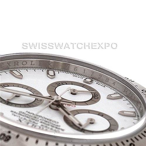 The image shows a close-up angled view of the dial and bezel of the Rolex Daytona 116520 Men's Stainless Steel White Dial 116520 Men's Stainless Steel White Dial watch, highlighting the subdials and tachymetric scale.