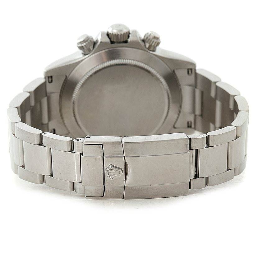 The image shows the back view of a Rolex Daytona 116520 Men
s Stainless Steel White Dial 116520 Men
s Stainless Steel White Dial watch, highlighting the case and metal bracelet clasp.