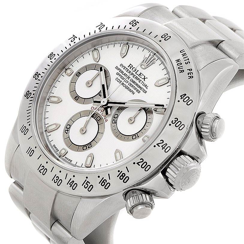 This image shows the front angle of a Rolex Daytona 116520 Men
s Stainless Steel White Dial 116520 Men
s Stainless Steel White Dial watch, highlighting its bezel, crown, sub-dials, and bracelet.