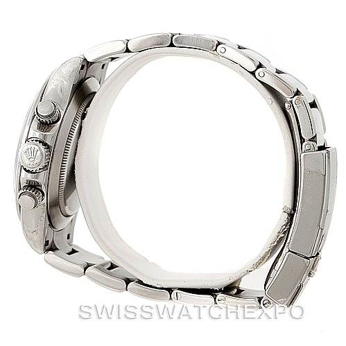 The image shows a side profile of a Rolex Daytona 116520 Men's Stainless Steel Black Dial 116520 Men's Stainless Steel Black Dial watch, displaying the crown and pushers on the side.