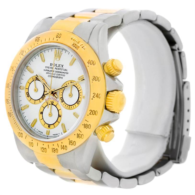 The Rolex Daytona 16523 Men's Steel and Gold (two tone) White Dial 16523 Men's Steel and Gold (two tone) White Dial watch is shown at a three-quarter angle, highlighting the face, bezel, crown, and strap.