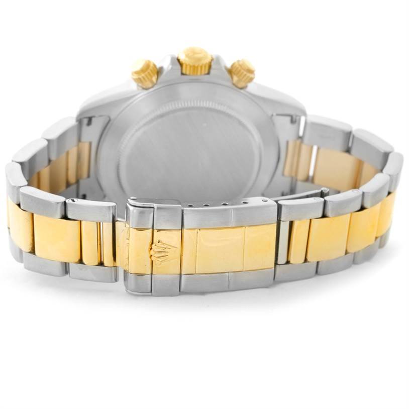 This image shows the back view of a Rolex Daytona 16523 Men's Steel and Gold (two tone) White Dial 16523 Men's Steel and Gold (two tone) White Dial watch, highlighting its clasp, bracelet, and case back.