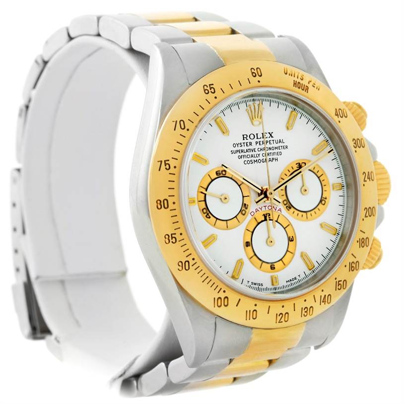 The image shows a Rolex Daytona 16523 Men's Steel and Gold (two tone) White Dial 16523 Men's Steel and Gold (two tone) White Dial watch angled slightly from the left, highlighting the bezel, dial, and partial bracelet.