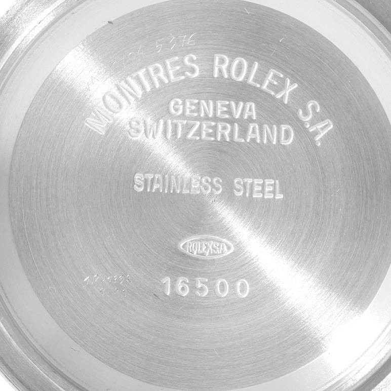 This image shows the case back of a Rolex Daytona 16523 Men's Steel and Gold (two tone) White Dial 16523 Men's Steel and Gold (two tone) White Dial watch, detailing its stainless steel construction and model number 16500.