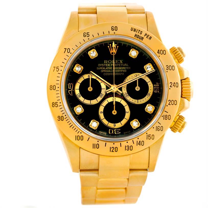 This Rolex Daytona Men's Yellow Gold Black Dial Men's Yellow Gold Black Dial watch is shown from a top-down angle, displaying the face, bezel, and bracelet.