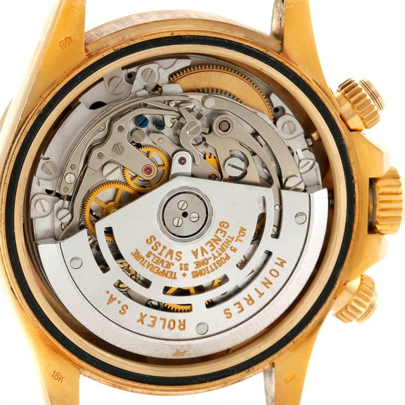 The image shows the internal mechanism and rotor of a Rolex Daytona Men's Yellow Gold Black Dial Men's Yellow Gold Black Dial watch from a back angle with the case back removed.