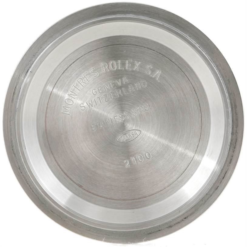 This image depicts the back case of a Rolex Daytona 116520 Men's Stainless Steel White Dial 116520 Men's Stainless Steel White Dial watch, showing its internal engraving with brand and model details.