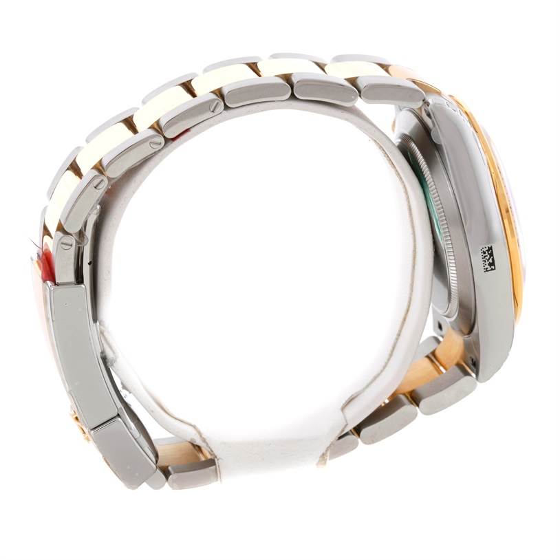 The image shows a side view of a Rolex Daytona 116523 Men's Steel and Gold (two tone) White Dial 116523 Men's Steel and Gold (two tone) White Dial, highlighting the bracelet and case sides.