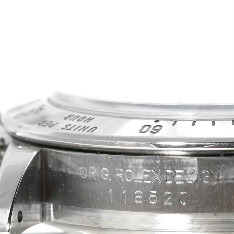 This image shows a close-up of the side and bezel of a Rolex Daytona 116520 Men's Stainless Steel White Dial 116520 Men's Stainless Steel White Dial watch, featuring the model number 116520.