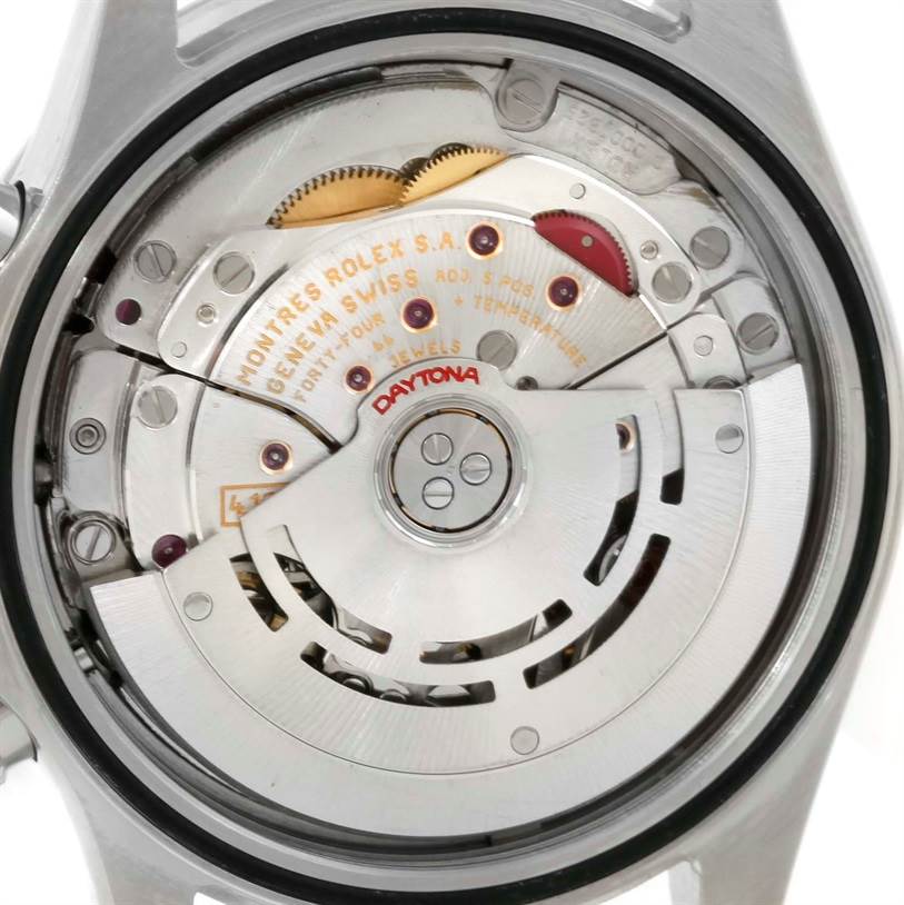 The image shows the back angle of a Rolex Daytona 116520 Men's Stainless Steel Black Dial 116520 Men's Stainless Steel Black Dial watch displaying its inner mechanical movement.