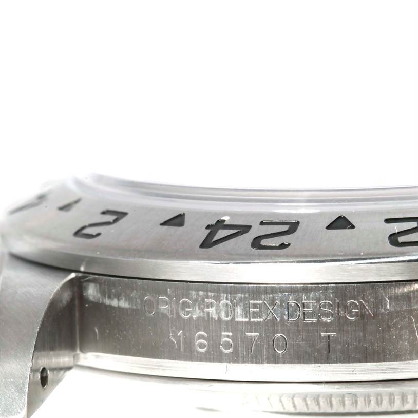 This image shows a side view of the bezel and reference number of a Rolex Explorer 16570 Men's Stainless Steel White Dial 16570 Men's Stainless Steel White Dial watch model 16570.