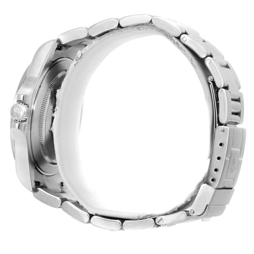 This image shows a side view of the Rolex Explorer 16570 Men's Stainless Steel White Dial 16570 Men's Stainless Steel White Dial watch featuring its crown, case, and bracelet.