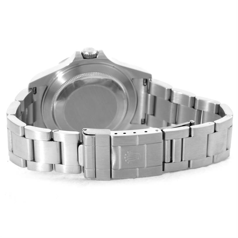 The image shows the back case and clasp of a Rolex Explorer 16570 Men's Stainless Steel White Dial 16570 Men's Stainless Steel White Dial watch, highlighting its bracelet and deployment clasp.