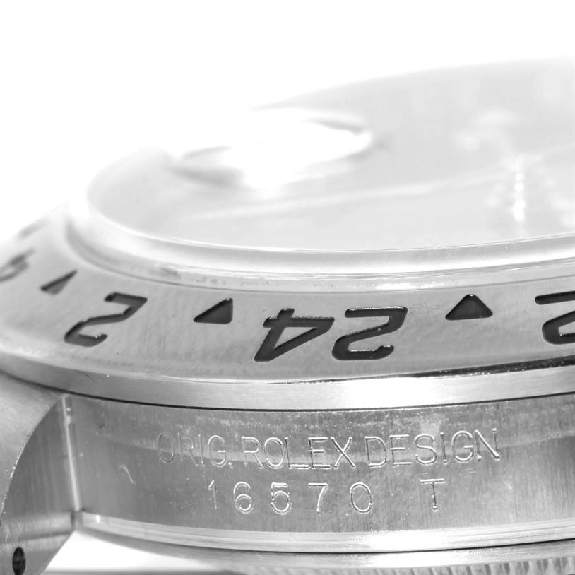 The image shows a close-up side view of the bezel and case prominently displaying the model number on the Rolex Explorer 16570 Men's Stainless Steel Black Dial 16570 Men's Stainless Steel Black Dial.