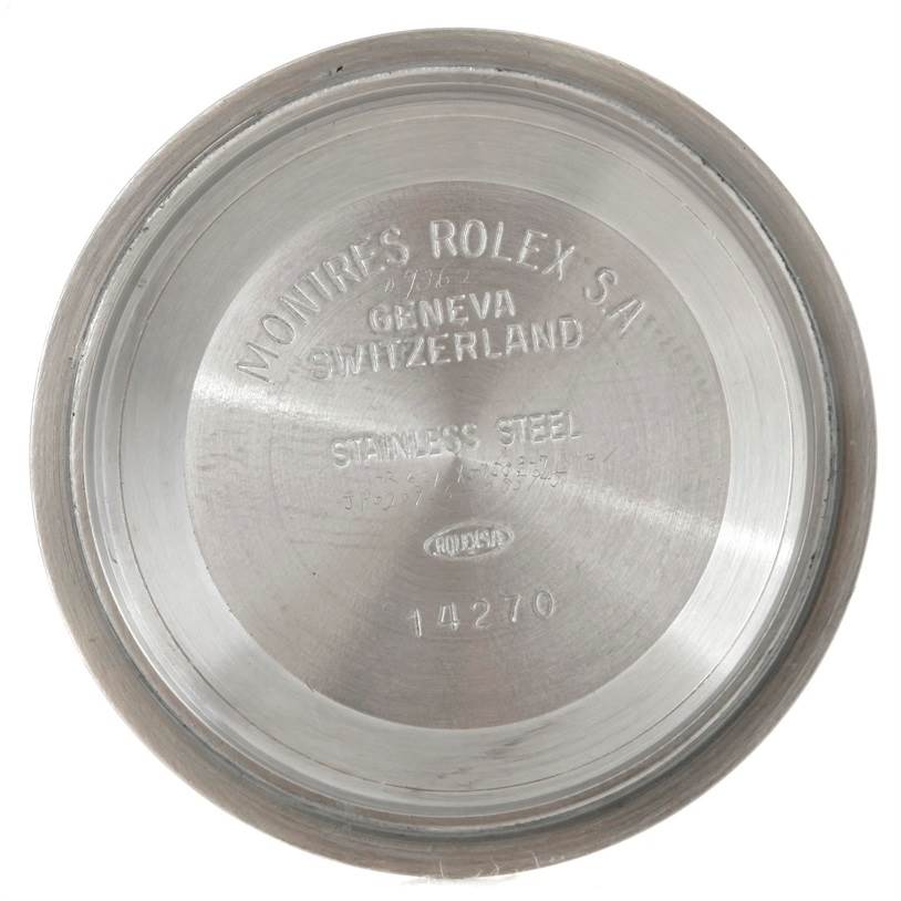 This image shows the inside case back of a Rolex Explorer 14270 Men's Stainless Steel Black Dial 14270 Men's Stainless Steel Black Dial watch, model number 14270, brand inscriptions are visible.