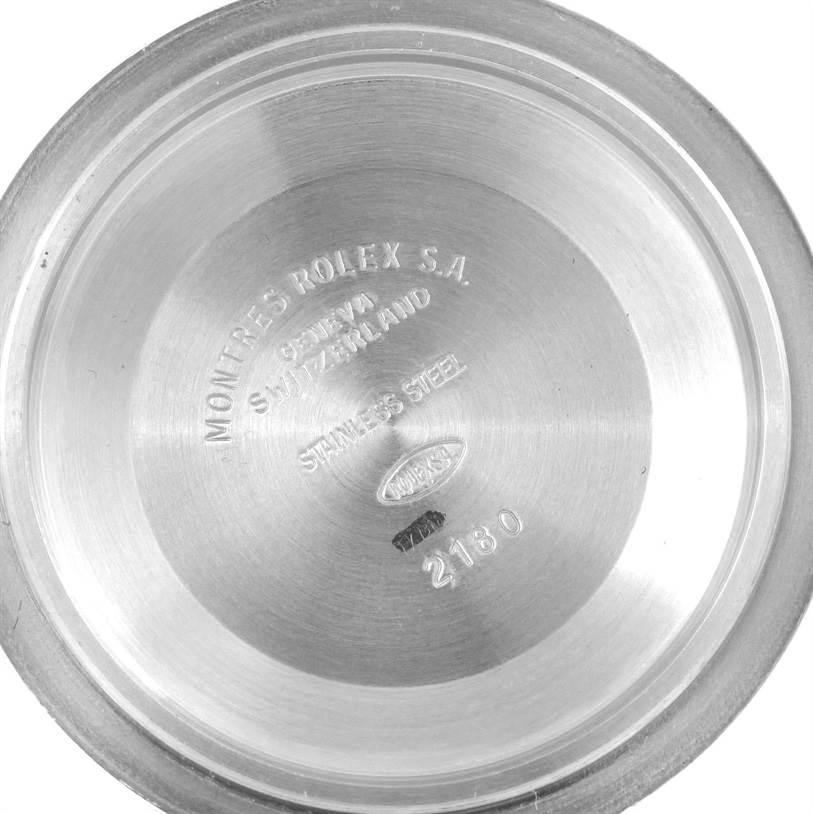 The image shows the inner case back of a Rolex Explorer 16570 Men's Stainless Steel Black Dial 16570 Men's Stainless Steel Black Dial watch, displaying brand engravings and the model number 2180.