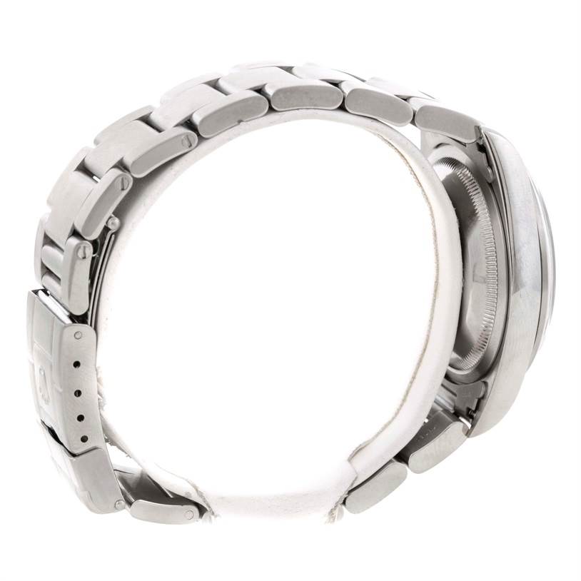 Side view of the Rolex Explorer 14270 Men's Stainless Steel Black Dial 14270 Men's Stainless Steel Black Dial showing the bracelet, clasp, and part of the case back.