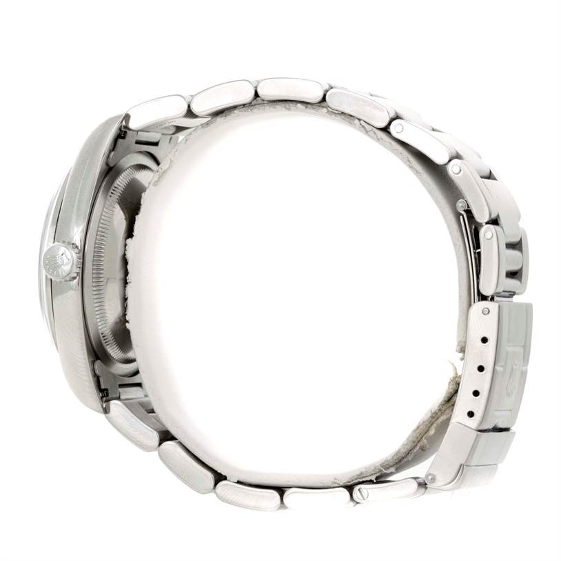 The image shows the side profile and bracelet of a Rolex Explorer 14270 Men's Stainless Steel Black Dial 14270 Men's Stainless Steel Black Dial watch.