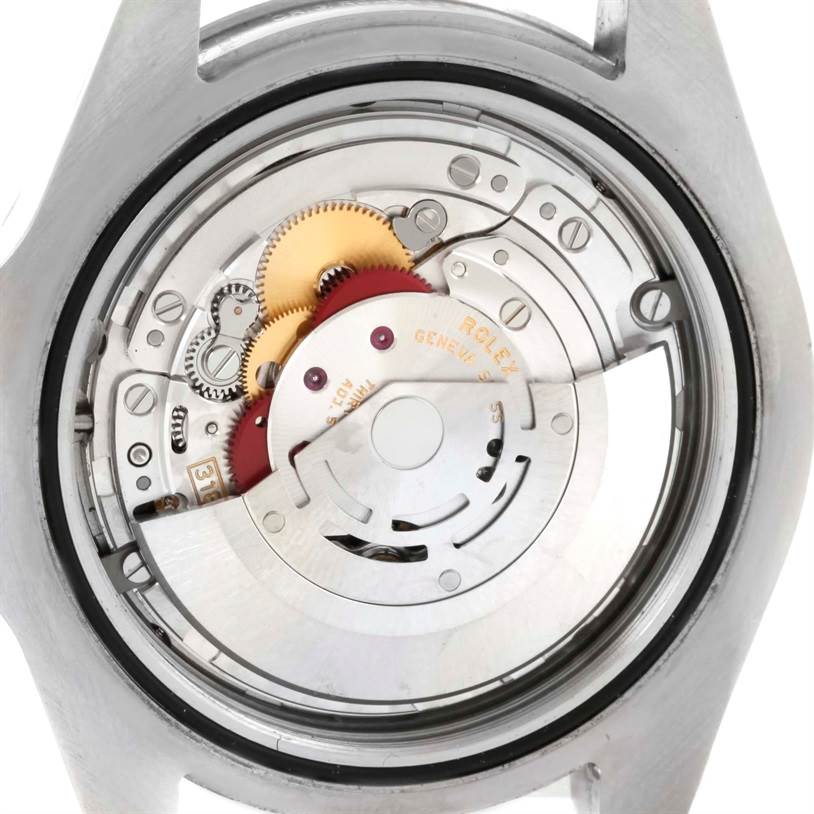 The image shows the internal mechanical components, or movement, of the Rolex Explorer 216570 Men
s Stainless Steel White Dial 216570 Men
s Stainless Steel White Dial watch viewed from the back.
