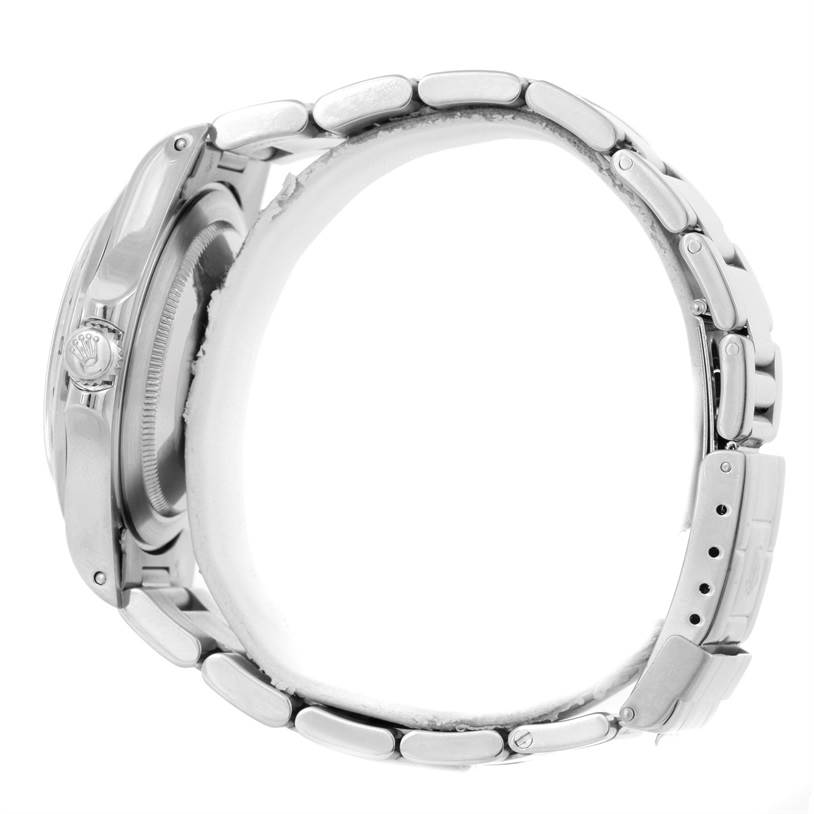 The image shows a side view of the Rolex Explorer 16570 Men's Stainless Steel Black Dial 16570 Men's Stainless Steel Black Dial, highlighting the profile of the case, crown, and bracelet.