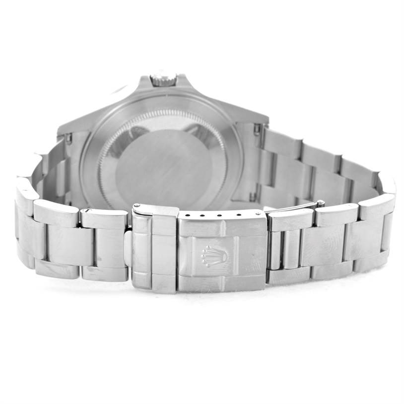The image shows the back of a Rolex Explorer 16570 Men's Stainless Steel White Dial 16570 Men's Stainless Steel White Dial watch, including its case back, bracelet, and clasp with the Rolex logo.