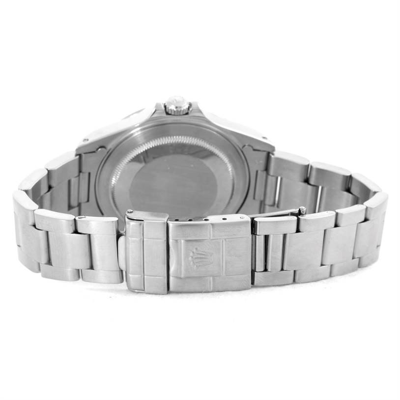 The image shows the back and bracelet of the Rolex Explorer 16570 Men's Stainless Steel White Dial 16570 Men's Stainless Steel White Dial watch, focusing on the clasp and caseback.