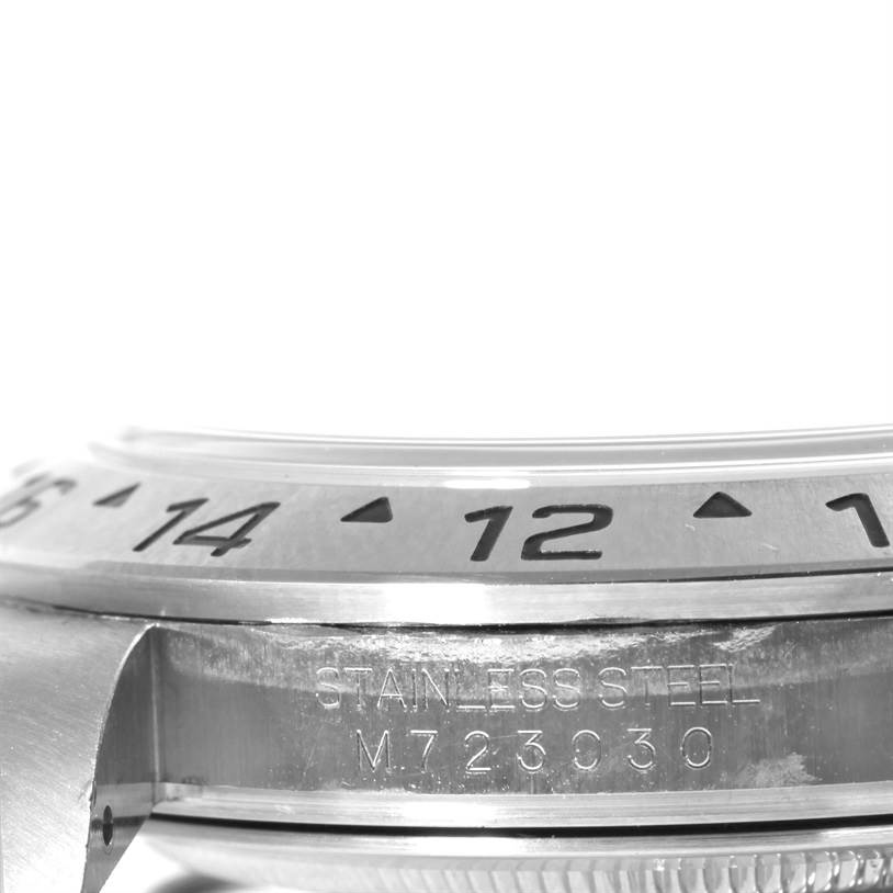 This close-up angle shows the bezel and case side of the Rolex Explorer 16570 Men's Stainless Steel Black Dial 16570 Men's Stainless Steel Black Dial watch, highlighting the engraved details.