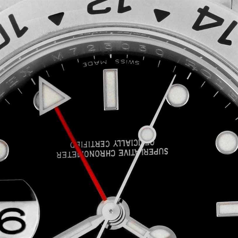 The image shows a close-up view of the Rolex Explorer 16570 Men's Stainless Steel Black Dial 16570 Men's Stainless Steel Black Dial watch's dial, hands, and part of the bezel with the "12" marker.