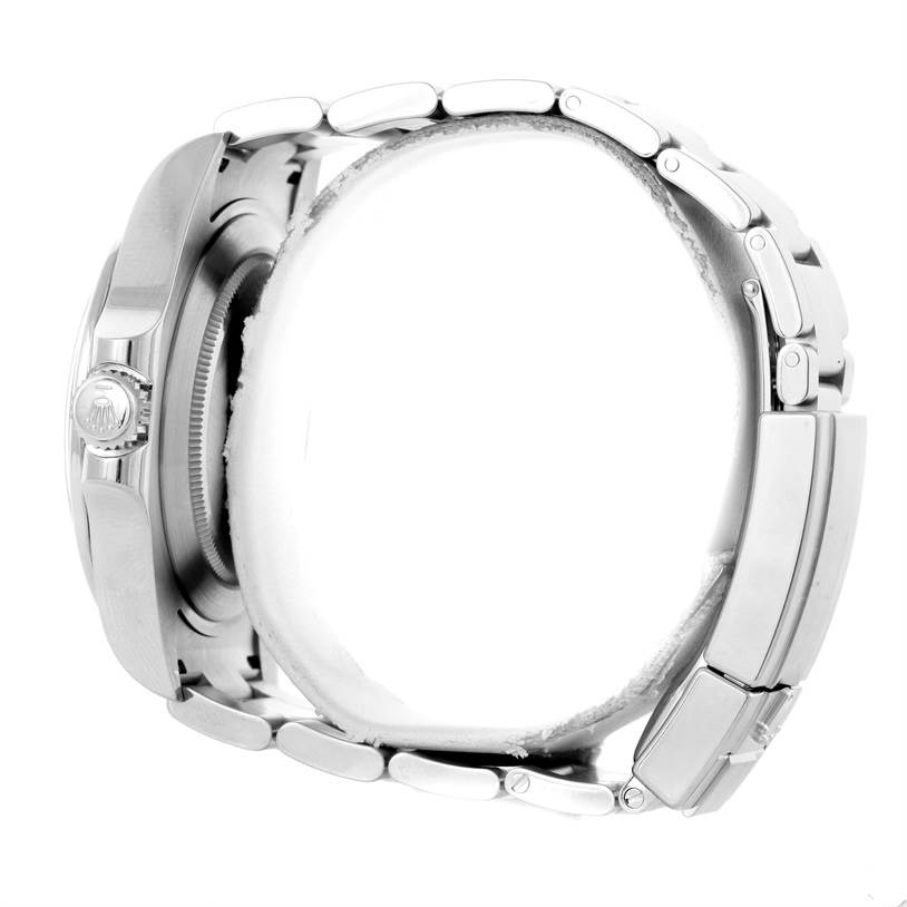 The image shows a side view of the Rolex Explorer 216570 Men
s Stainless Steel Black Dial 216570 Men
s Stainless Steel Black Dial watch, highlighting the case, crown, and bracelet links.