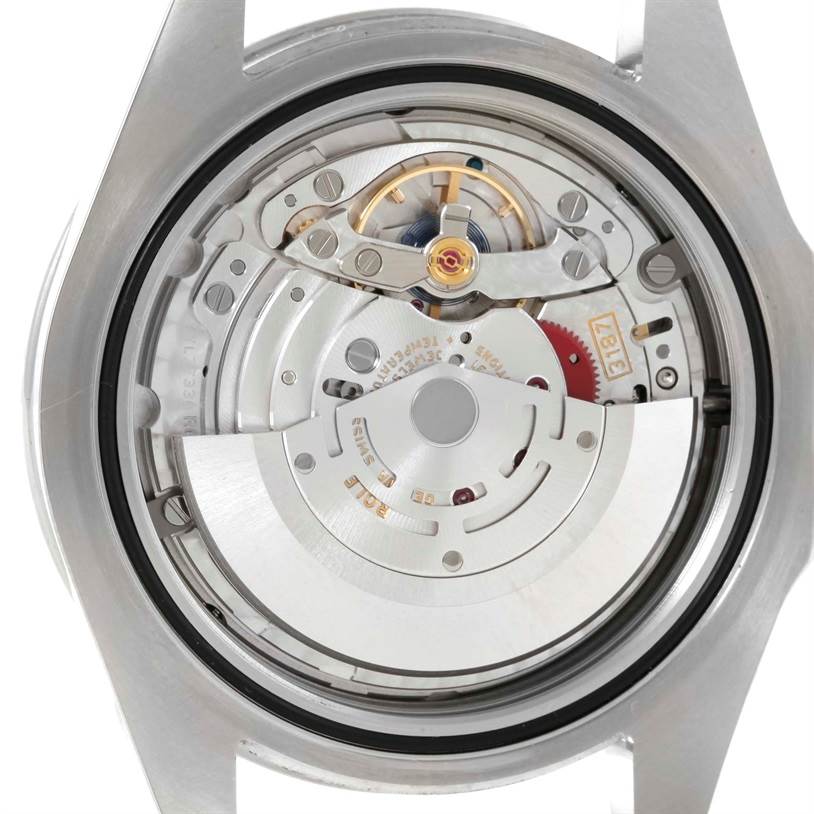 The image shows the movement mechanism of a Rolex Explorer 216570 Men
s Stainless Steel Black Dial 216570 Men
s Stainless Steel Black Dial watch from a rear angle without its case back.