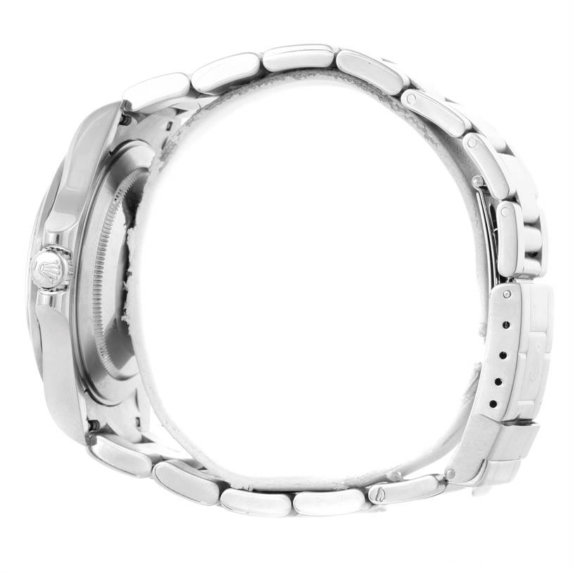 This image shows a side view of the Rolex Explorer 16570 Men's Stainless Steel White Dial 16570 Men's Stainless Steel White Dial watch, focusing on the crown, case side, and bracelet.