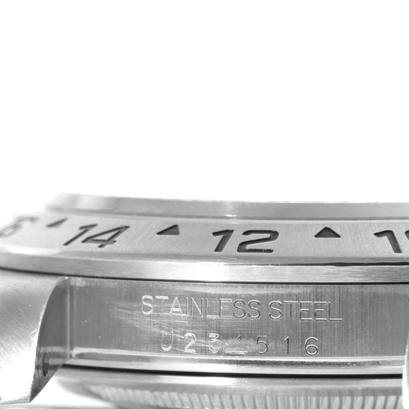 This close-up image shows the stainless steel side and bezel with engraved numbers of the Rolex Explorer 16570 Men
s Stainless Steel White Dial 16570 Men
s Stainless Steel White Dial watch.