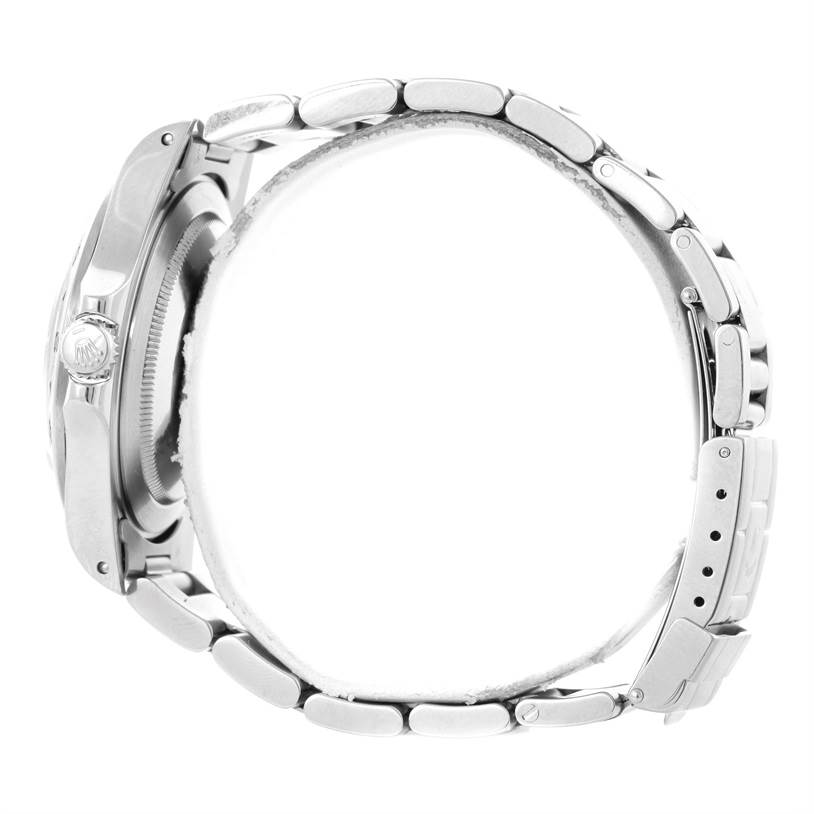 The image shows a side view of the Rolex Explorer 16570 Men
s Stainless Steel White Dial 16570 Men
s Stainless Steel White Dial watch, highlighting the case, crown, and metal bracelet.