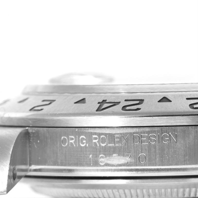 This image shows the engraved side view of the case and bezel of a Rolex Explorer 16570 Men
s Stainless Steel White Dial 16570 Men
s Stainless Steel White Dial model watch.