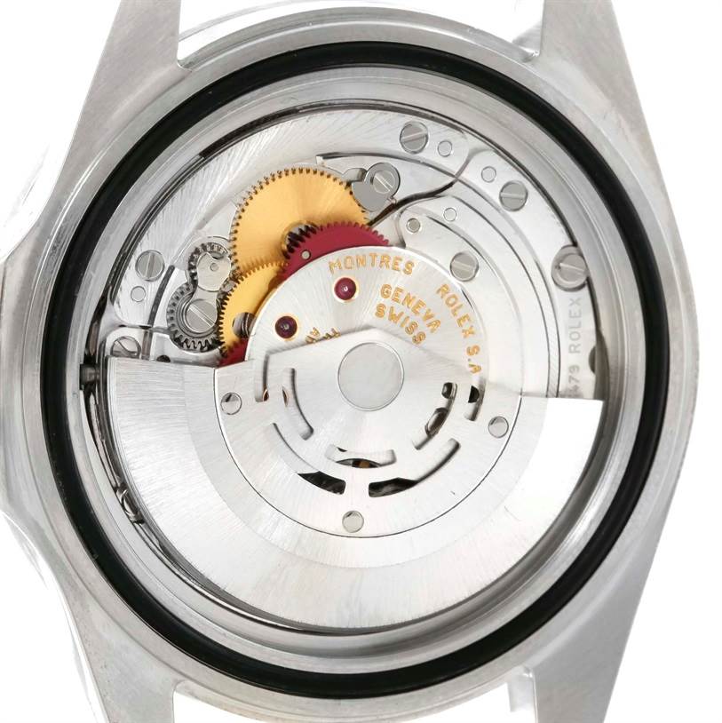 The image shows the back view of the Rolex Explorer 16570 Men's Stainless Steel White Dial 16570 Men's Stainless Steel White Dial watch, revealing its internal mechanical components and movement.