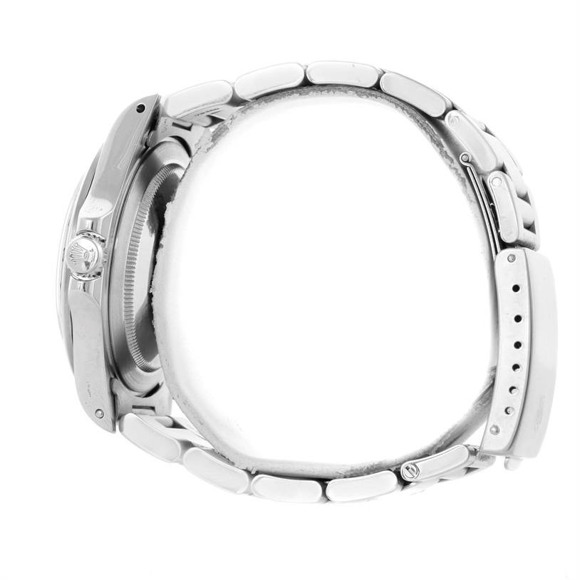 This image shows the side view of a Rolex Explorer 16570 Men's Stainless Steel White Dial 16570 Men's Stainless Steel White Dial watch, highlighting the bracelet, clasp, and crown.