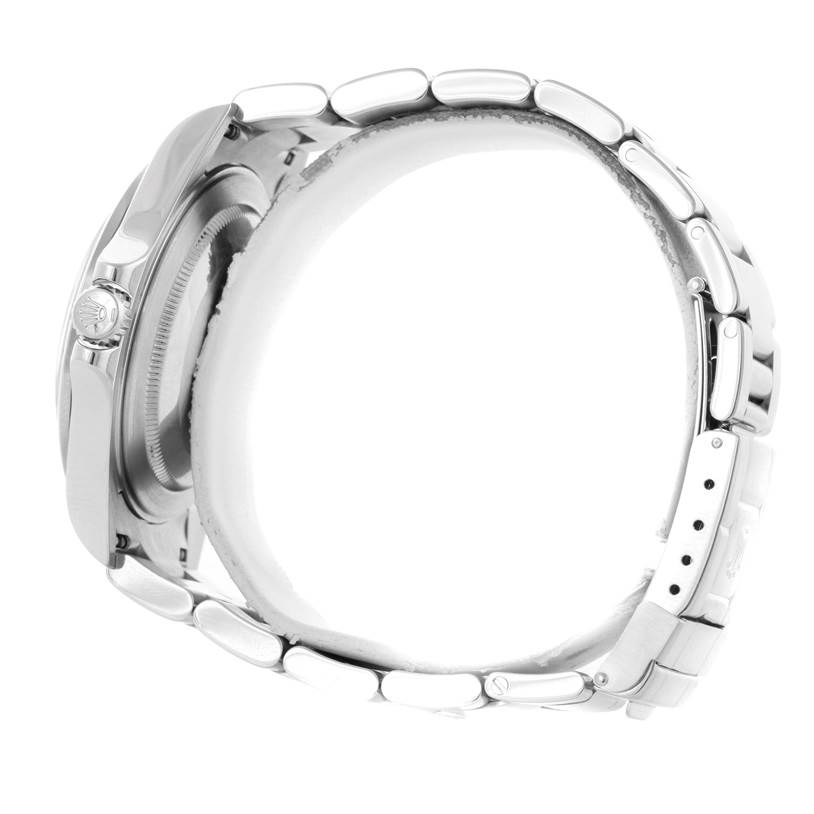 The image shows the side view of a Rolex Explorer 16570 Men's Stainless Steel Black Dial 16570 Men's Stainless Steel Black Dial, highlighting its crown and bracelet links.