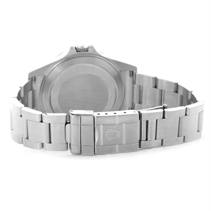 This image shows the back case and clasp of a Rolex Explorer 16570 Men's Stainless Steel Black Dial 16570 Men's Stainless Steel Black Dial watch, highlighting the metal bracelet and Rolex logo on the clasp.