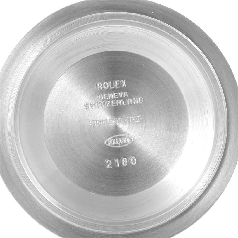 This image shows the inside of a Rolex Explorer 16570 Men's Stainless Steel Black Dial 16570 Men's Stainless Steel Black Dial watch's case back, with brand and material details engraved.