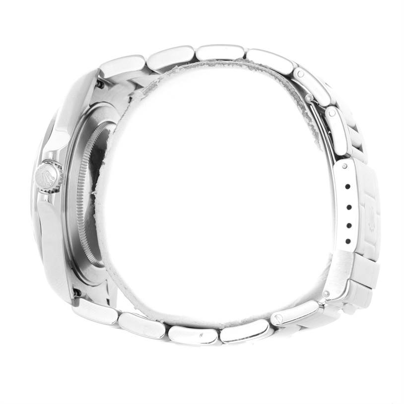 The image shows a side view of a Rolex Explorer 16570 Men's Stainless Steel Black Dial 16570 Men's Stainless Steel Black Dial watch, highlighting the crown, bezel, and part of the bracelet.