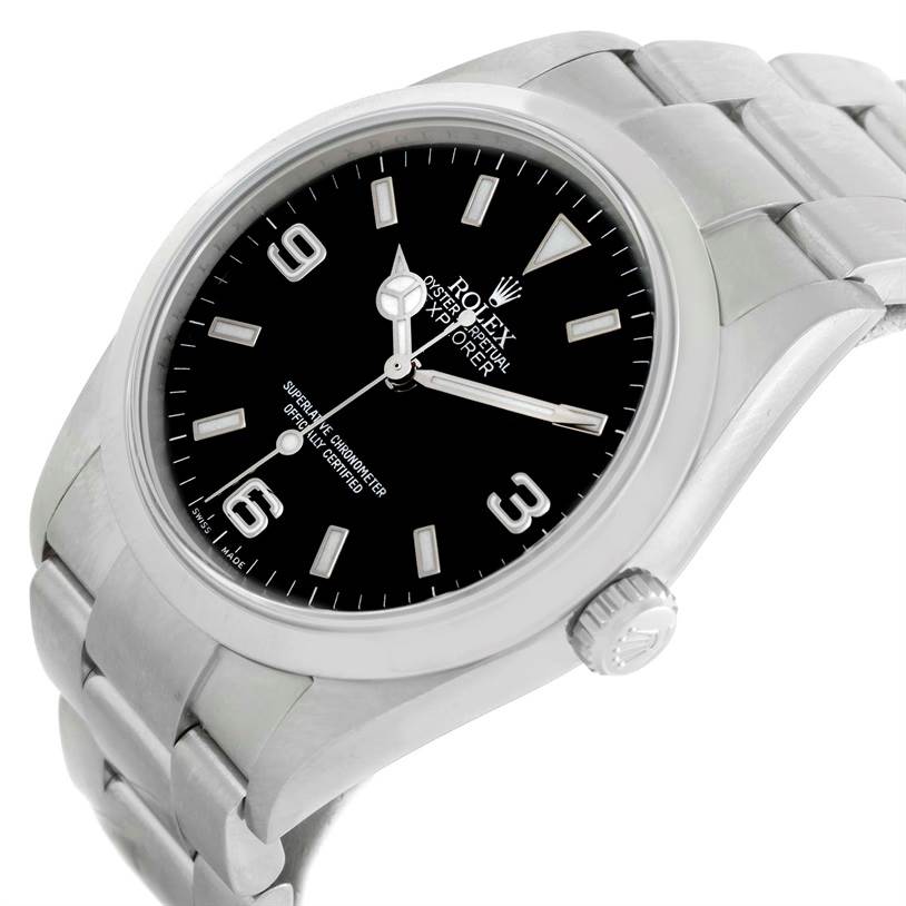 The image shows the dial, crown, and bracelet of a Rolex Explorer 114270 Men's Stainless Steel Black Dial 114270 Men's Stainless Steel Black Dial watch from a tilted angle.