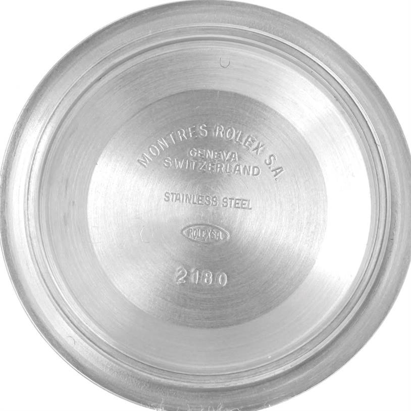 This image shows the interior of the case back of a Rolex Explorer 16570 Men's Stainless Steel White Dial 16570 Men's Stainless Steel White Dial watch, engraved with brand and model details.