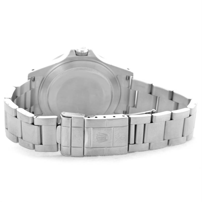 The image shows the back case and bracelet of a Rolex Explorer 16570 Men's Stainless Steel White Dial 16570 Men's Stainless Steel White Dial watch, angled from the rear facing the clasp.