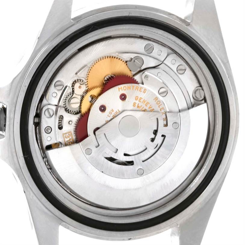 The image shows a close-up view of the movement and inner mechanisms of a Rolex Explorer 16570 Men's Stainless Steel White Dial 16570 Men's Stainless Steel White Dial watch.