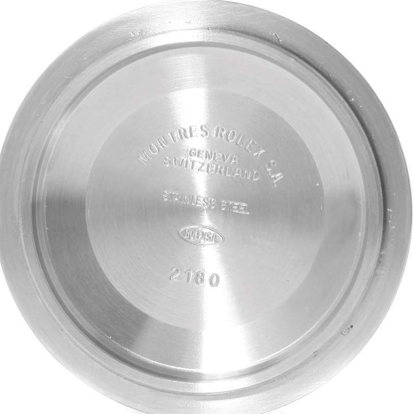 The image shows the back case of a Rolex Explorer 16570 Men's Stainless Steel White Dial 16570 Men's Stainless Steel White Dial model watch from an overhead angle.