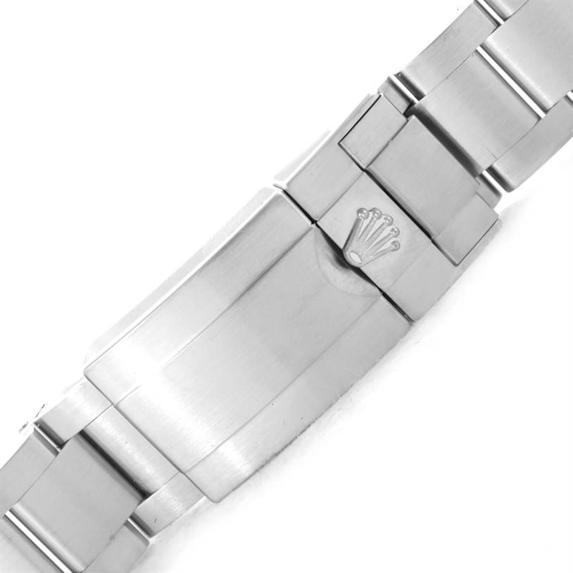 This image shows the clasp and part of the bracelet of the Rolex Explorer 216570 Men's Stainless Steel White Dial 216570 Men's Stainless Steel White Dial watch, focusing on the brand's logo.