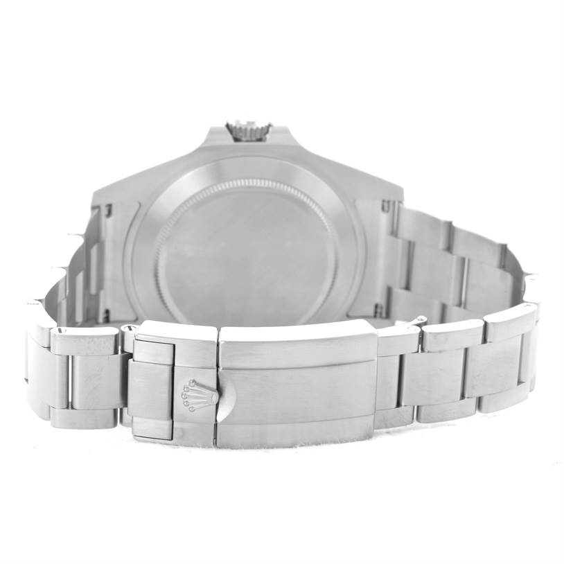 The image shows the back view of the Rolex Explorer 216570 Men's Stainless Steel White Dial 216570 Men's Stainless Steel White Dial watch, displaying its stainless steel case and bracelet with the clasp.