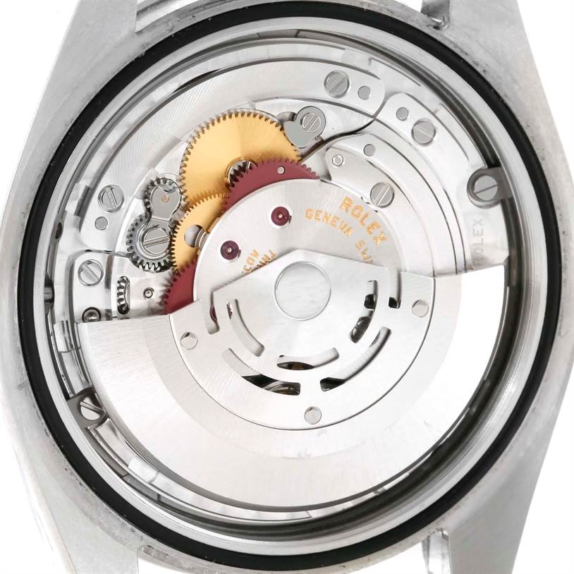 This image shows an internal view of the Rolex Explorer 214270 Men's Stainless Steel Black Dial 214270 Men's Stainless Steel Black Dial's movement mechanism, emphasizing gears and intricate components.